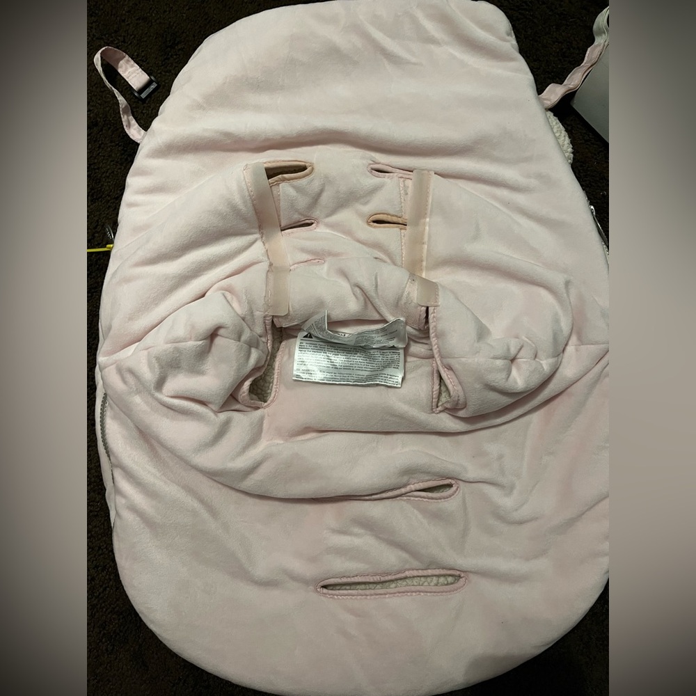 Light Pink car seat cover lightly used Brand is JJ Cole Collections Bundle Me